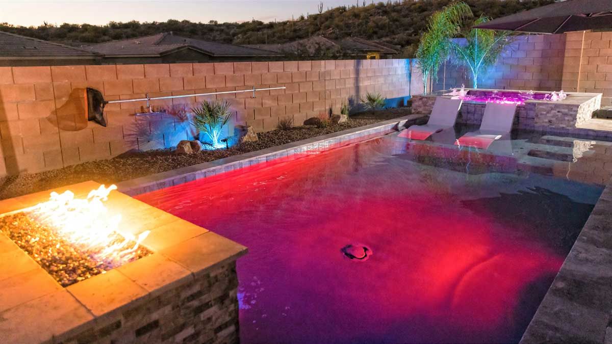 pool construction finished, with a pool's stove and lighted landscape